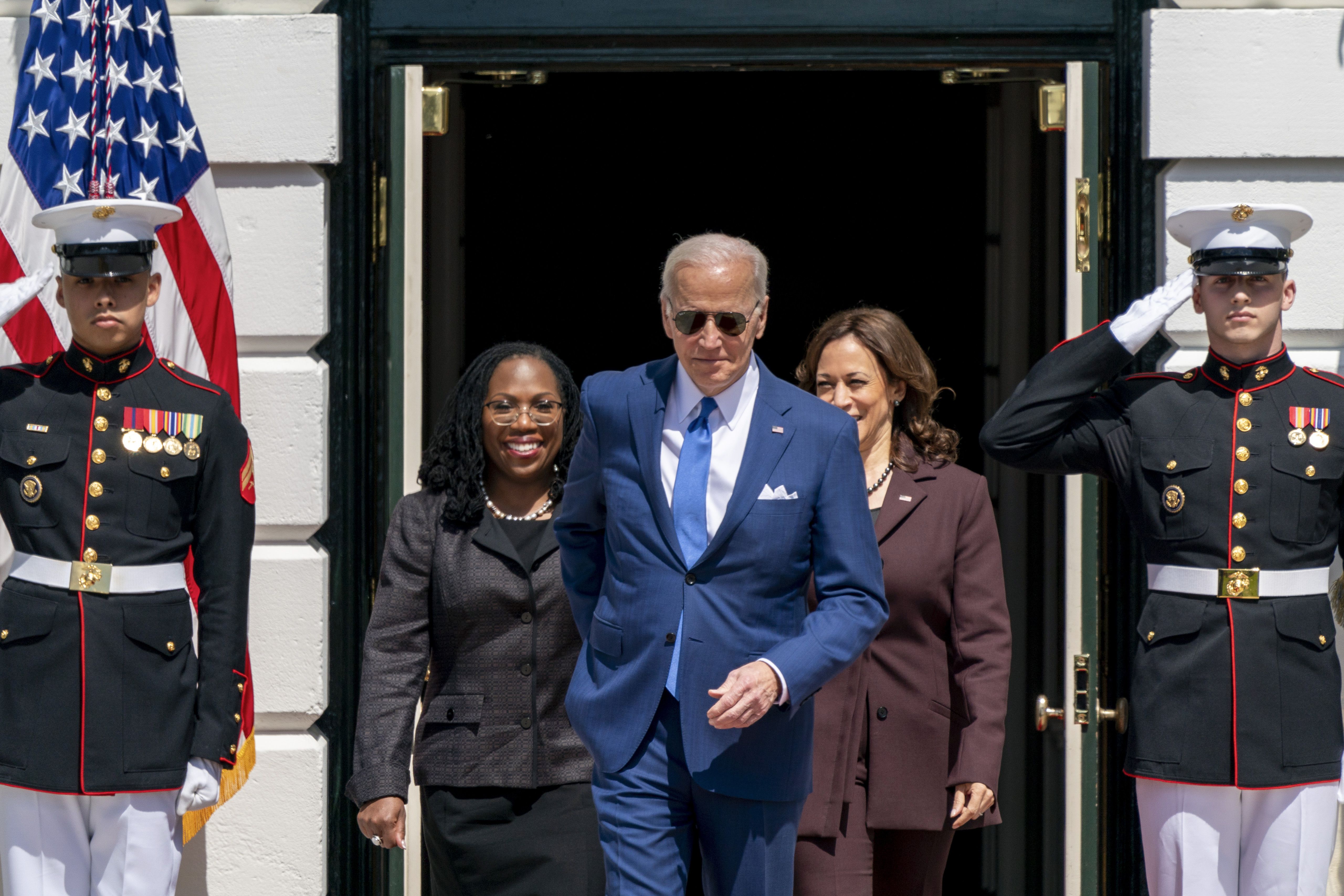 President Joe Biden, accompanied by Vice President Kamala Harris and Judge Ketanji Brown Jackson, arrives to speak at an event on the South Lawn of the White House in Washington on April 8, celebrating the confirmation of Jackson as the first Black woman to reach the Supreme Court.