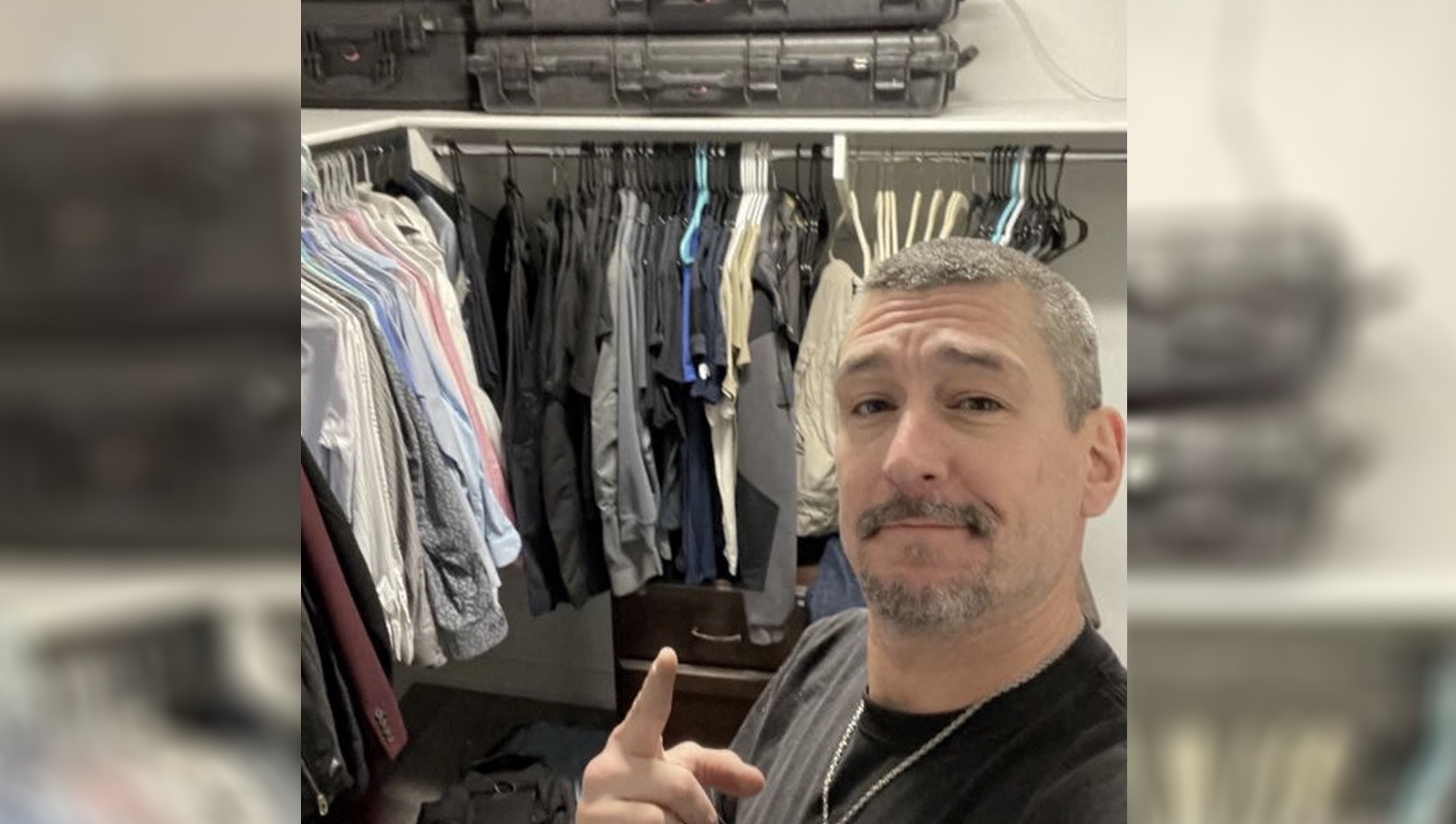 Arian Taherzadeh is seen in an undated selfie photo that the FBI says he sent to a U.S. Secret Service agent showing what the FBI said are cases in his apartment that are often used to transport firearms.