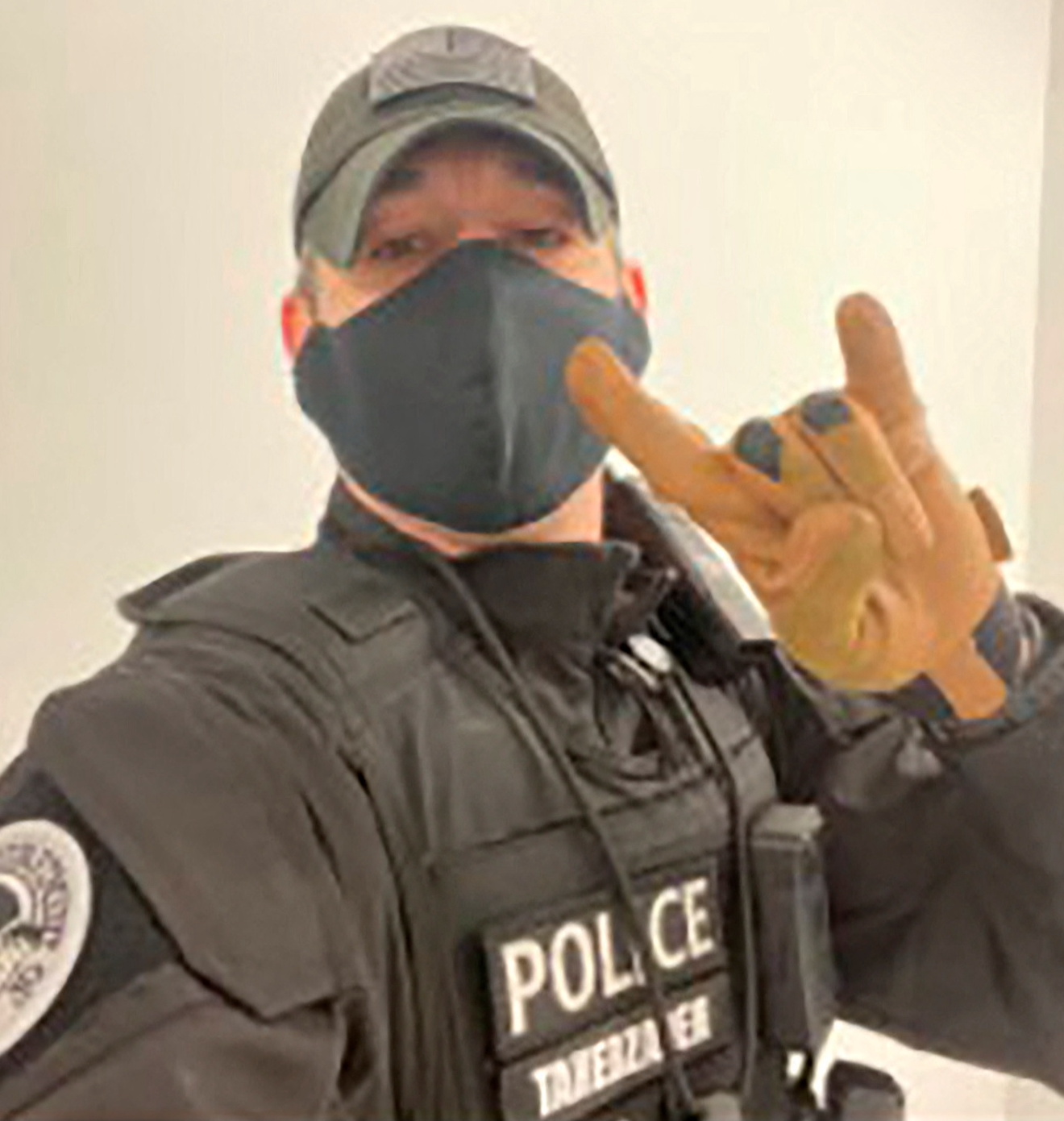 Arian Taherzadeh is seen in a January 2021 photo wearing a Department of Homeland Security uniform that the FBI says he sent to a U.S. Secret Service agent. Taherzadeh is accused of impersonating a federal agent.