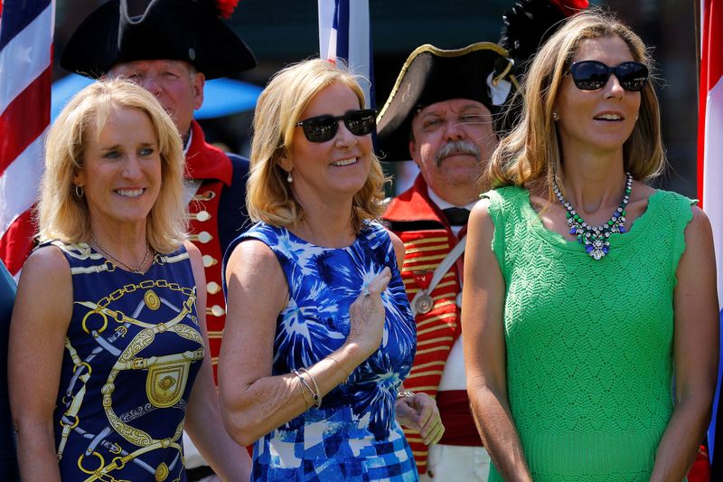 FILE PHOTO: Hall of Famers (L-R) Tracy Austin, Chris Evert and Monica Seles stand together during a group photograph at the 2014 induction ceremonies at the International Tennis Hall of Fame in Newport, Rhode Island July 12, 2014.