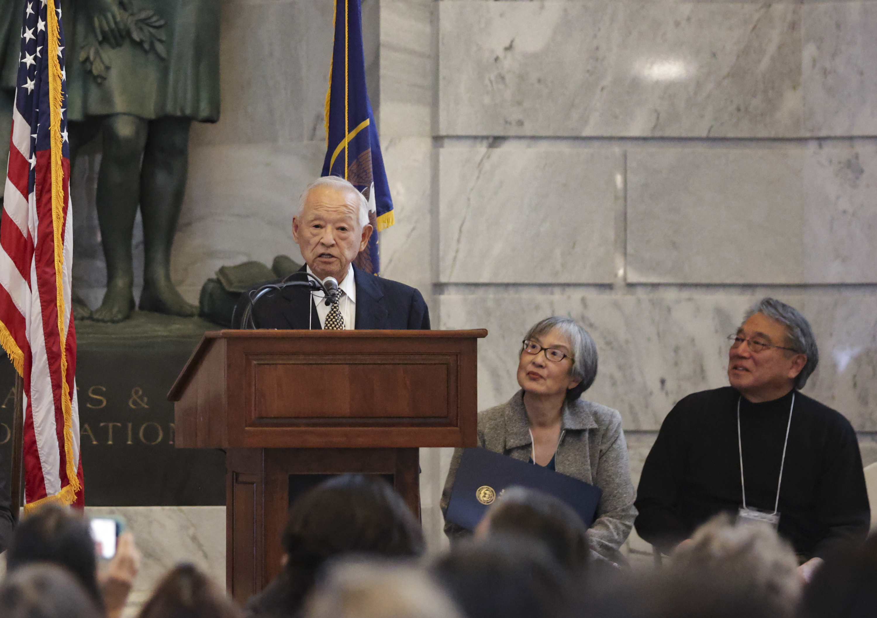 Joseph Nishimura, survivor of Topaz Camp, speaks at the reception for the Topaz Stories exhibition at the Capitol in Salt Lake City on Friday.