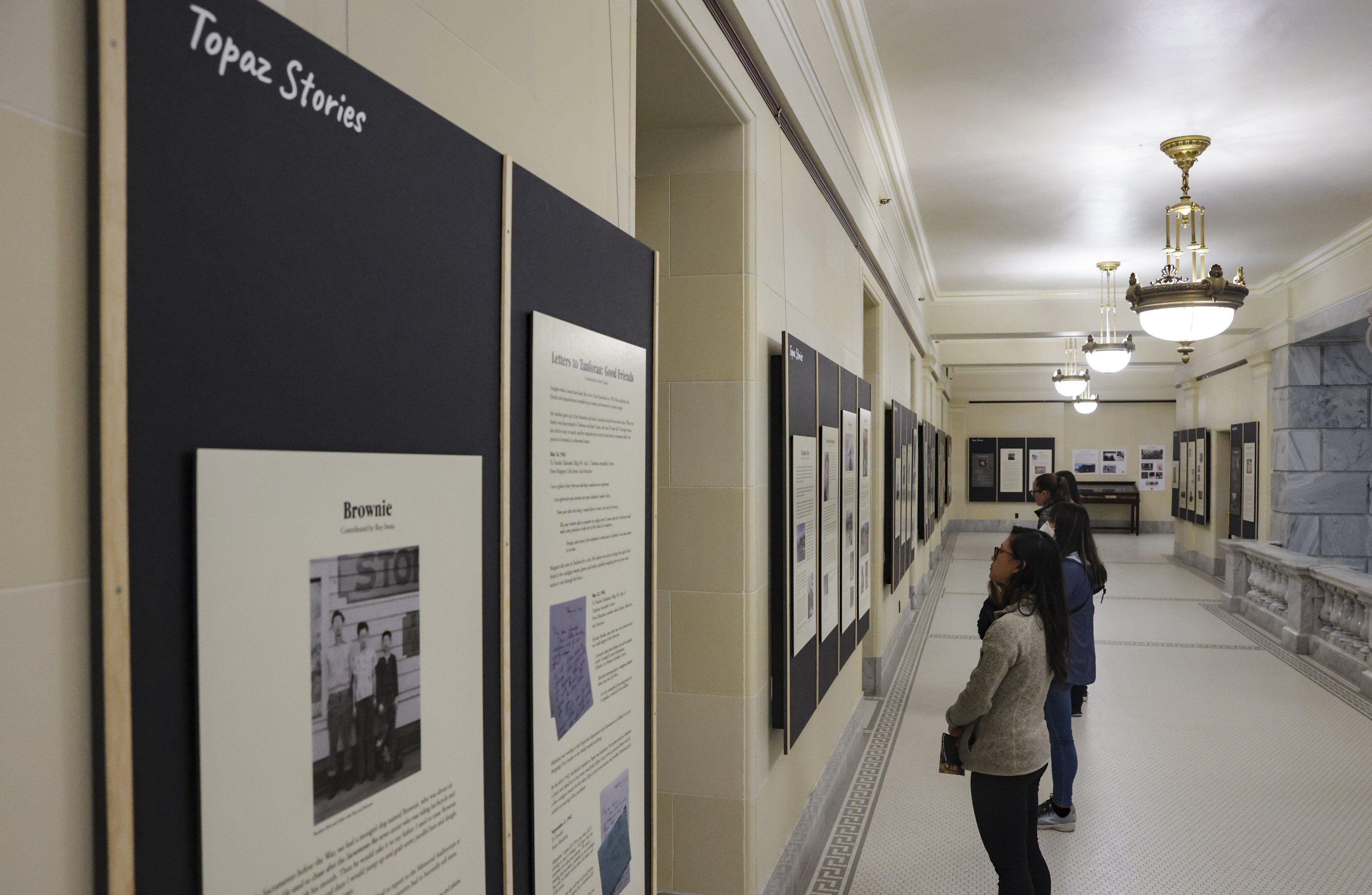 Topaz Camp survivors, Japanese Americans who were imprisoned during WWII outside of Delta, Utah, contribute their stories to the Topaz Stories exhibition at the Capitol in Salt Lake City on Friday.