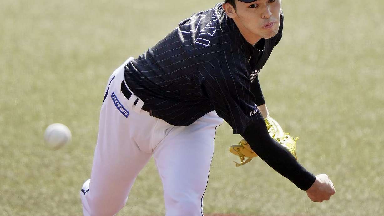 FILE - Chiba Lotte Marines Roki Sasaki pitches during a game against the Orix Buffaloes in Chiba, near Tokyo, Sunday, April 10, 2022. Japan's 20-year-old Sasaki almost did it again. A week after pitching a perfect game, the first in Japanese professional baseball in 28 years, Sasaki was perfect on Sunday, April 17, through eight innings before being pulled after throwing 102 pitches.