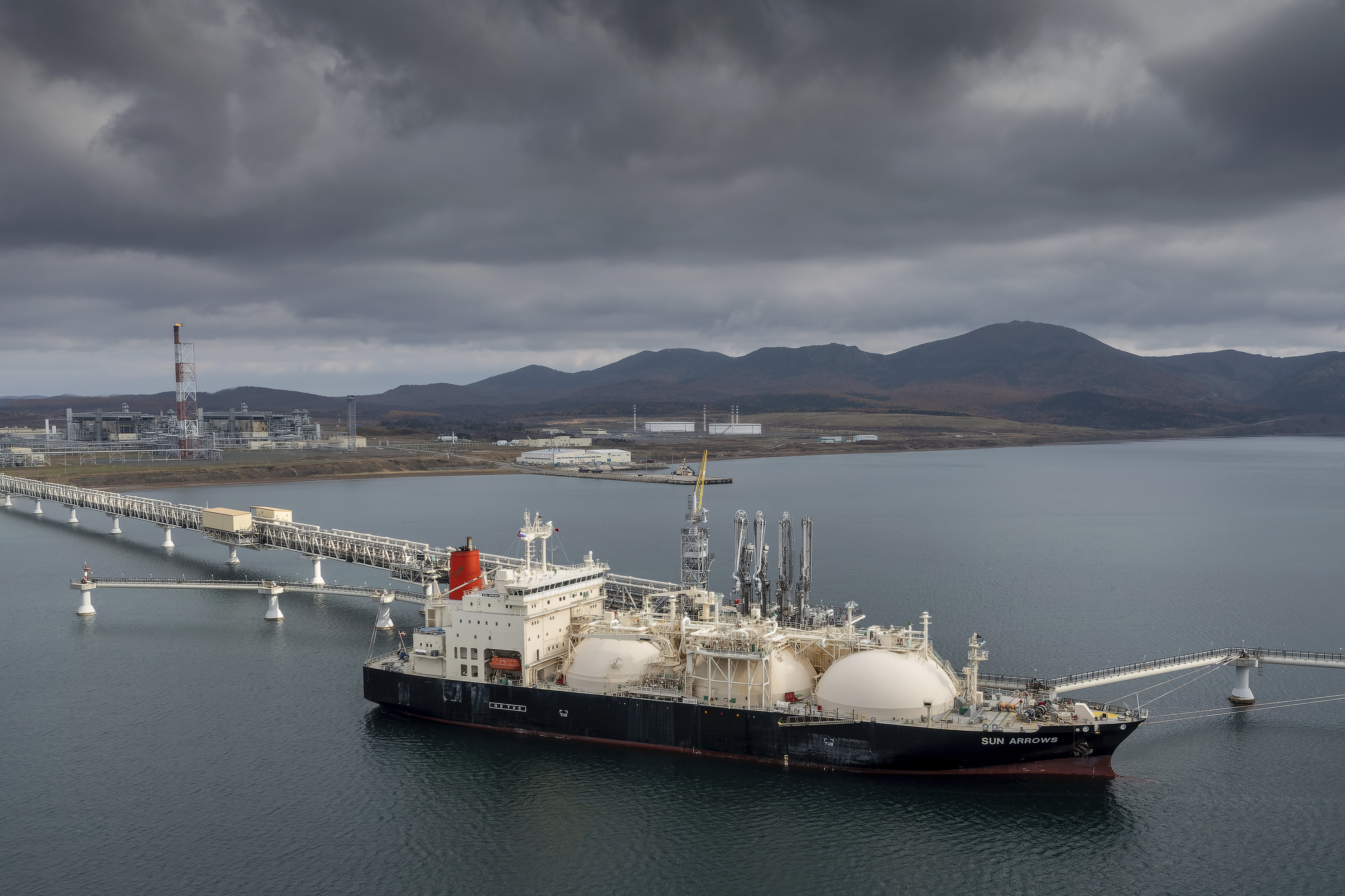 The tanker Sun Arrows loads its cargo of liquefied natural gas from the Sakhalin-2 project in the port of Prigorodnoye, Russia. While Russia can claim some symbolic victories, the full impact of Western sanctions is starting to be felt in very real ways.