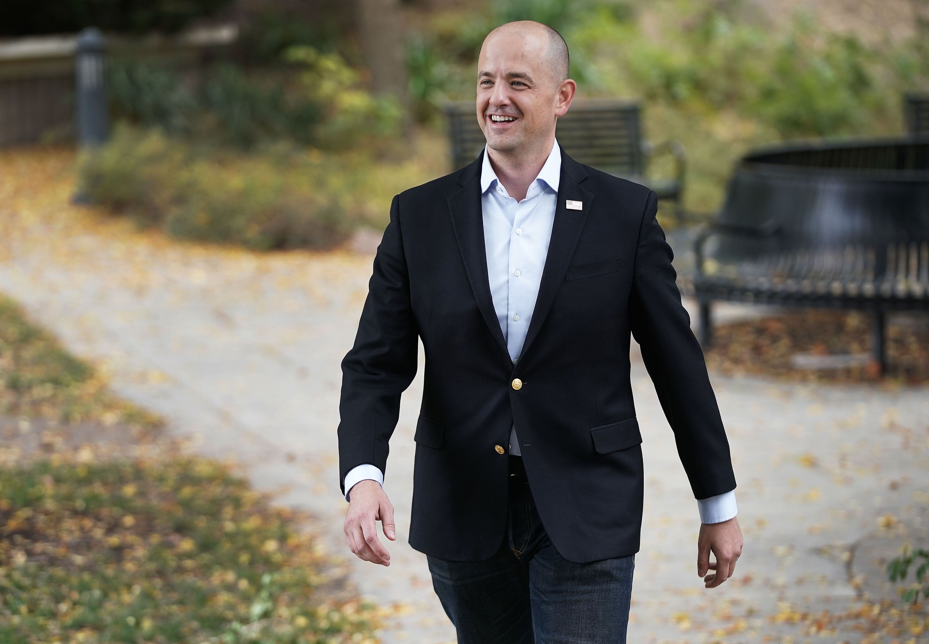 Evan McMullin walk back to his car after an interview in Salt Lake City on Oct. 5, 2021. McMullin is running for Sen. Mike Lee’s seat as an independent..