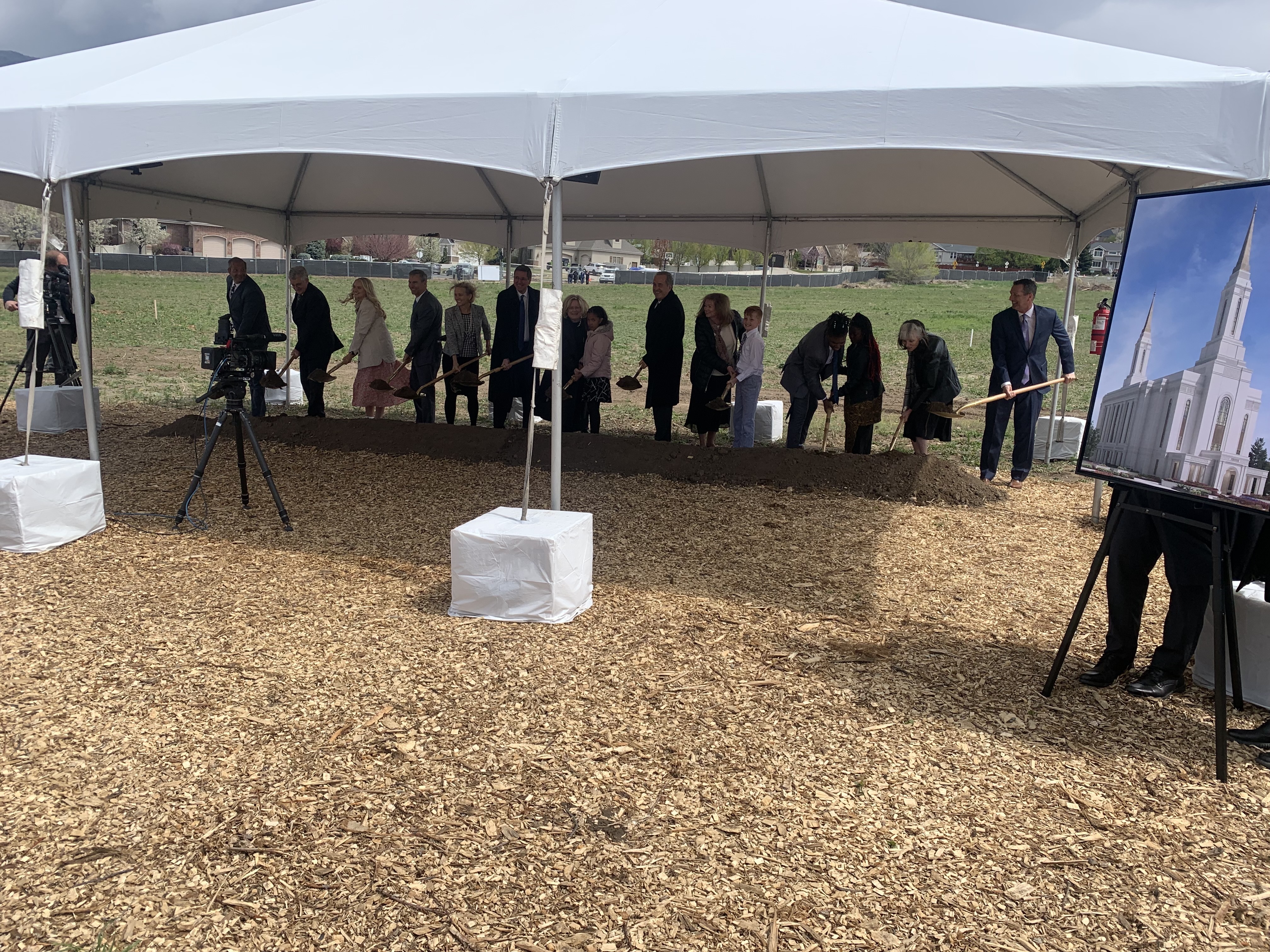 Elder Kevin W. Pearson and others participate in the groundbreaking for the Lindon Utah Temple on Saturday. 