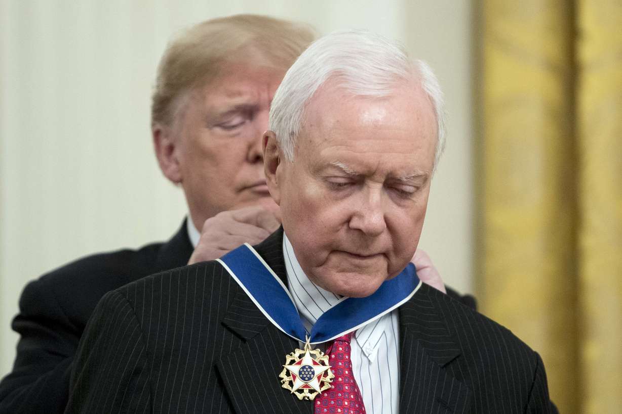 President Donald Trump awards Sen. Orrin Hatch, R-Utah, the Medal of Freedom during a ceremony in the East Room of the White House in Washington on Friday, Nov. 16, 2018.