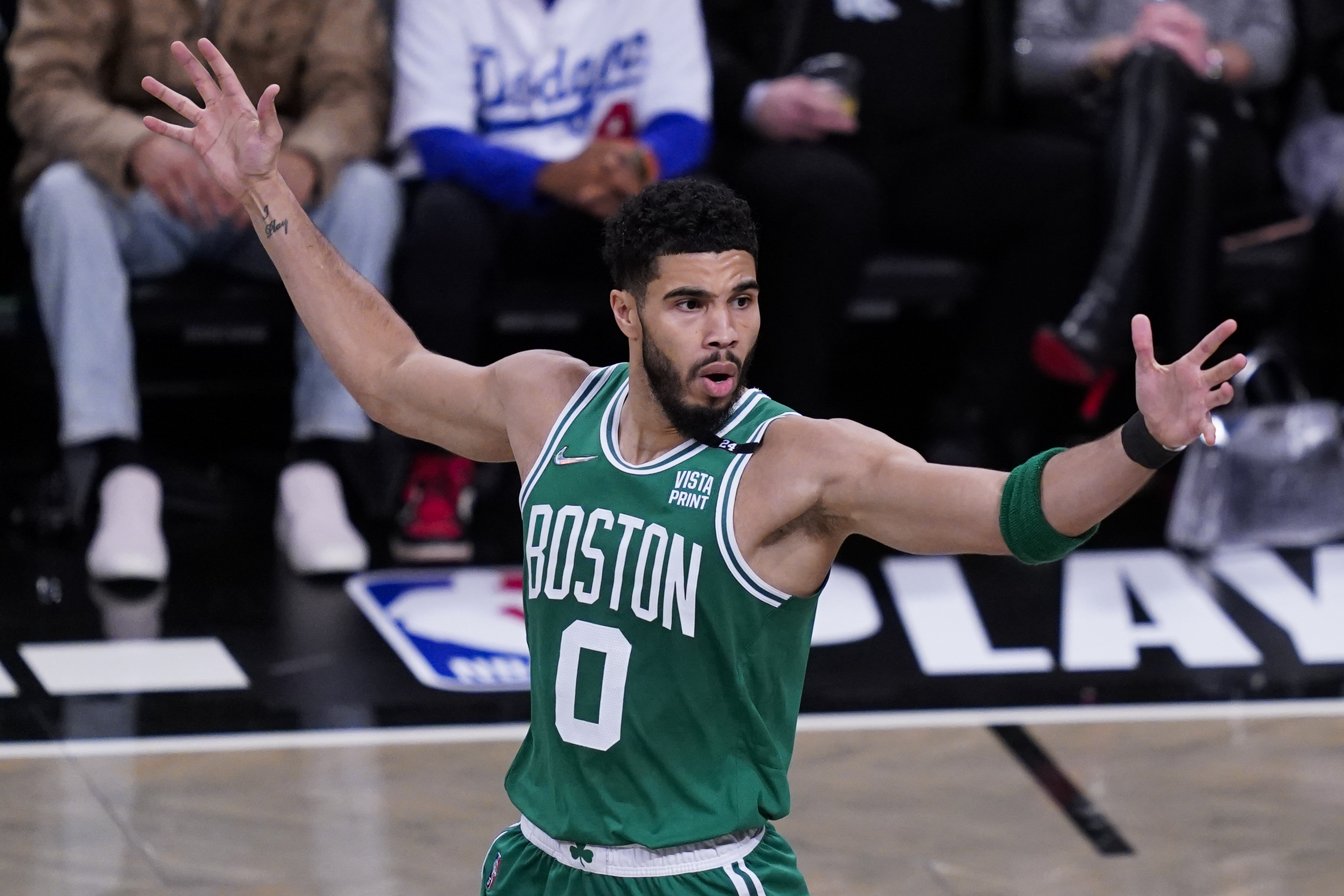 Boston Celtics forward Jayson Tatum (0) reacts to a referee's call during the first half of Game 3 of the team's NBA basketball first-round playoff series against the Brooklyn Nets, Saturday, April 23, 2022, in New York. 