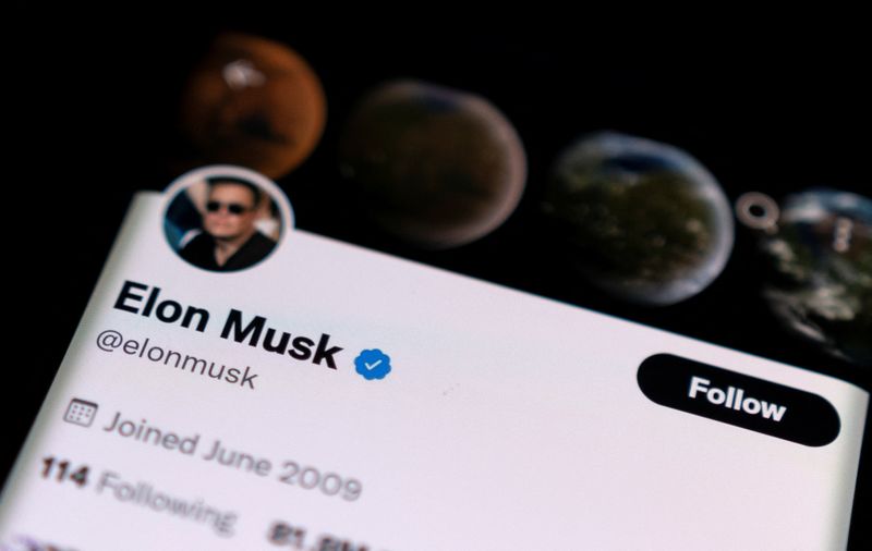 Elon Musk's Twitter account is seen on a smartphone in this photo illustration taken April 15.