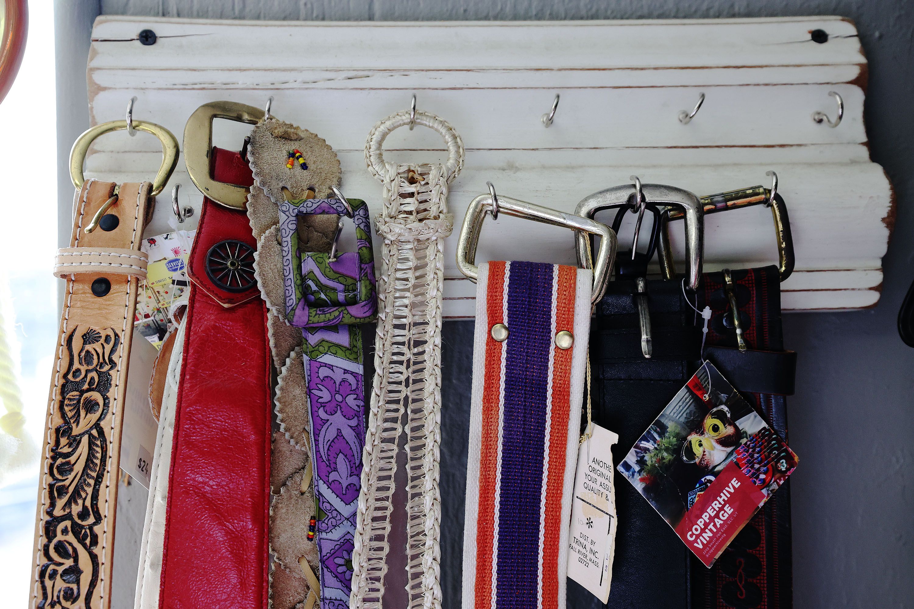 Vintage belts for sale at Copperhive Vintage in Salt Lake City are pictured on April 14.