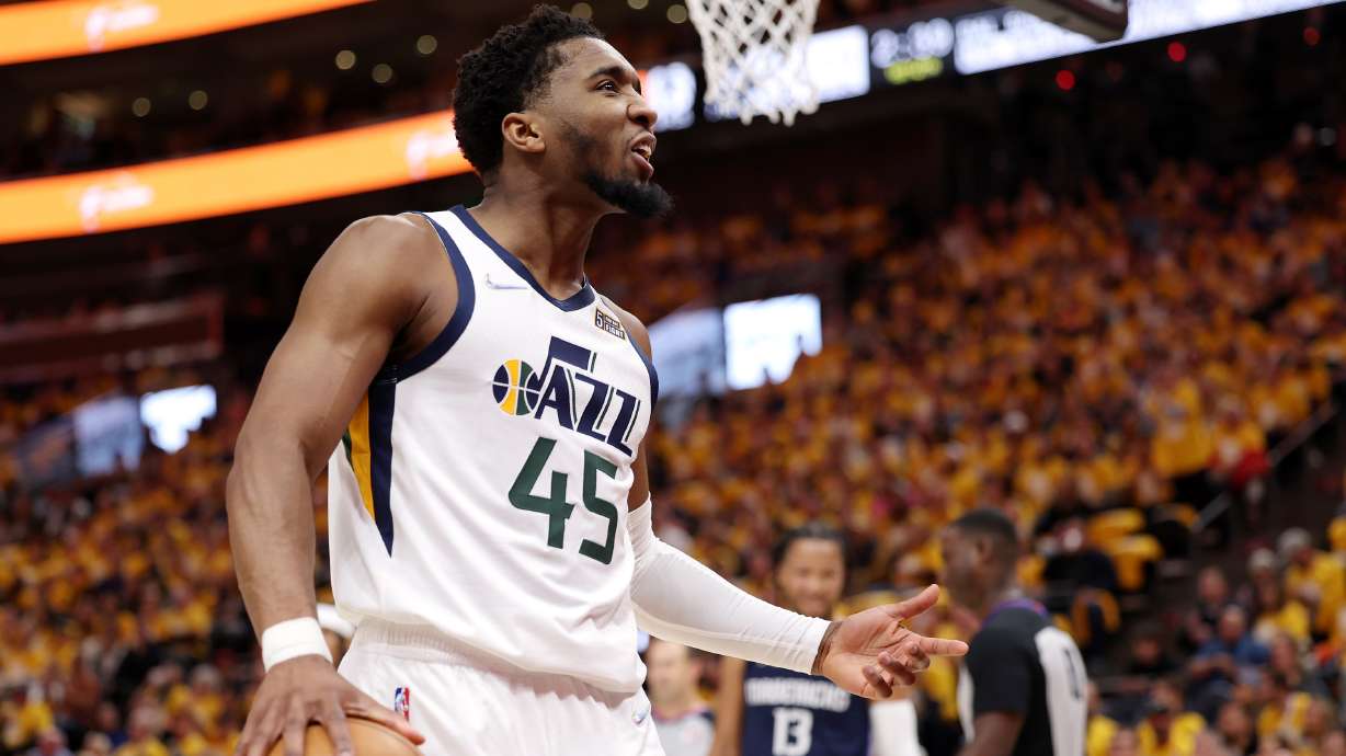 Utah Jazz guard Donovan Mitchell (45) gets the crowd worked up after a play as the Utah Jazz and the Dallas Mavericks play Game 4 of their NBA playoff series at Vivint Arena in Salt Lake City on Saturday, April 23, 2022. Utah won 100-99.