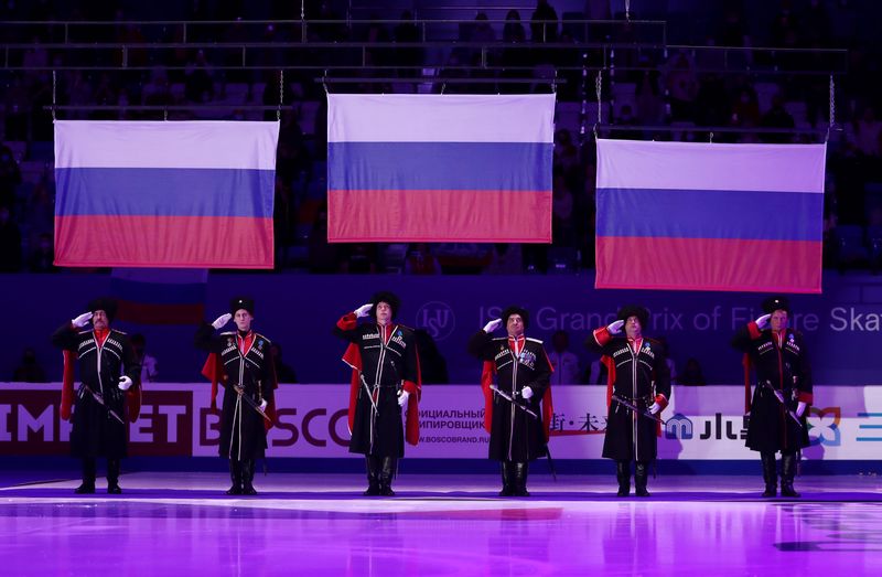 FILE PHOTO: Figure Skating - ISU Grand Prix of Figure Skating - 2021 Rostelecom Cup - The Iceberg Skating Palace, Sochi, Russia - November 28, 2021 Russia flags are raised during the ceremony