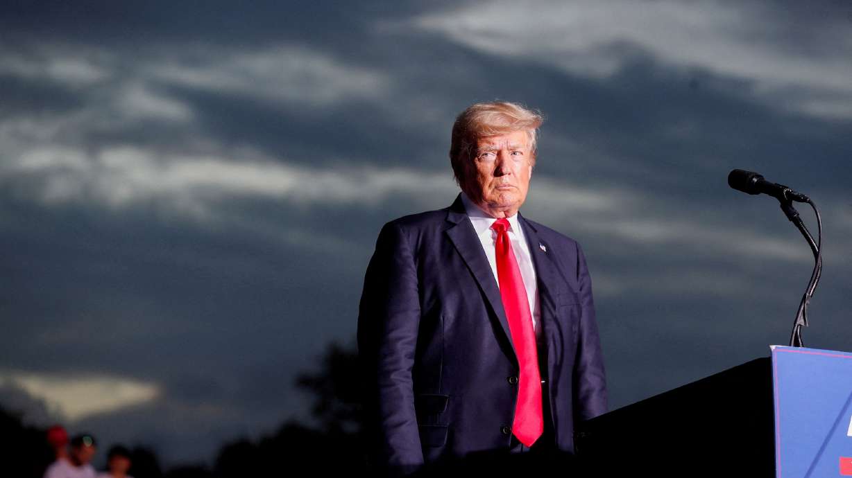 Former President Donald Trump speaks to his supporters in Sarasota, Florida, July 3, 2021. A New York judge on Monday held Trump in contempt of court for not producing documents subpoenaed in the state attorney general's civil probe of his business practices.