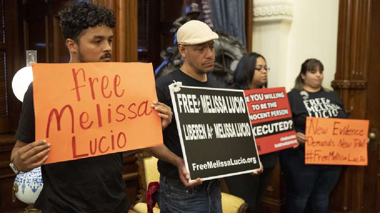Supporters of death row inmate Melissa Lucio, including Justin Rosario, left to right, Mark Anthony Vasquez, April Agosto and Amerika Leija, wait in the Governor's Public Reception Room at the Capitol, in Austin, Texas, on Monday for a decision from the Board of Pardons and Paroles about her clemency. A Texas appeals court on Monday delayed Lucio's execution.