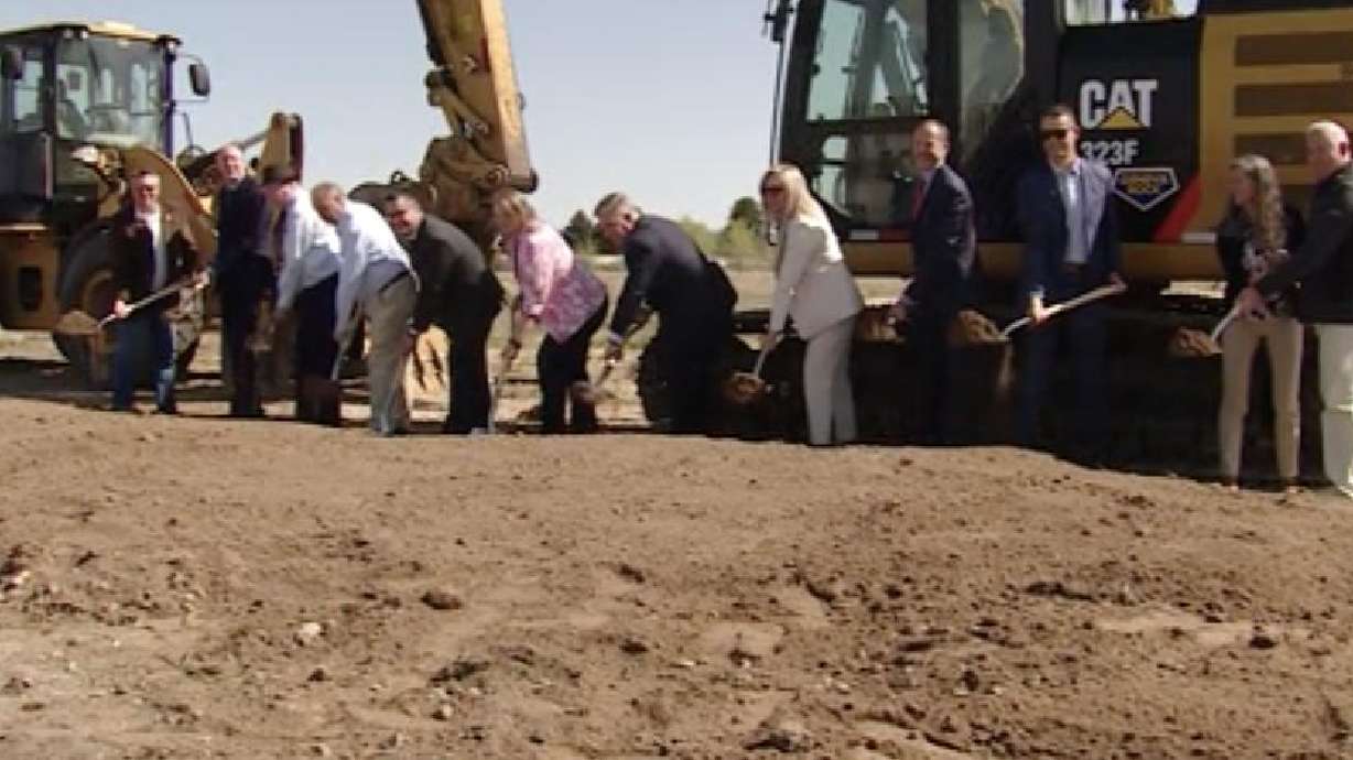 Clearfield leaders, Utah Transit Authority executives and others break ground on a massive transportation community project Monday. City leaders say it may take two decades for the project to be completed.