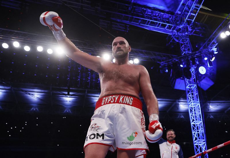 FILE PHOTO: Boxing - Tyson Fury v Dillian Whyte - WBC World Heavyweight Title - Wembley Stadium, London, Britain - April 23, 2022  Tyson Fury celebrates winning his fight against Dillian Whyte Action Images via Reuters/Andrew Couldridge