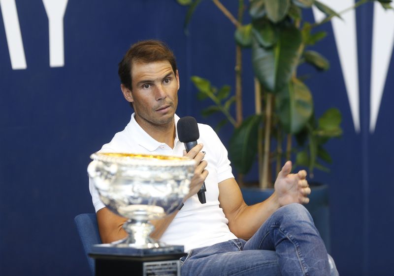 FILE PHOTO: Tennis - Rafael Nadal Press Conference - Rafa Nadal Academy, Mallorca, Spain - February 2, 2022 Spain's Rafael Nadal with the Australian Open trophy during the press conference