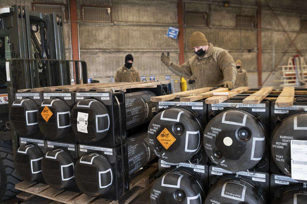 Airmen and civilians from the 436th Aerial Port Squadron palletize ammunition, weapons and other equipment bound for Ukraine during a foreign military sales mission at Dover Air Force Base, Del., on Jan. 21. The longer Ukraine's army fends off the invading Russians, the more it absorbs the advantages of Western weaponry and training.