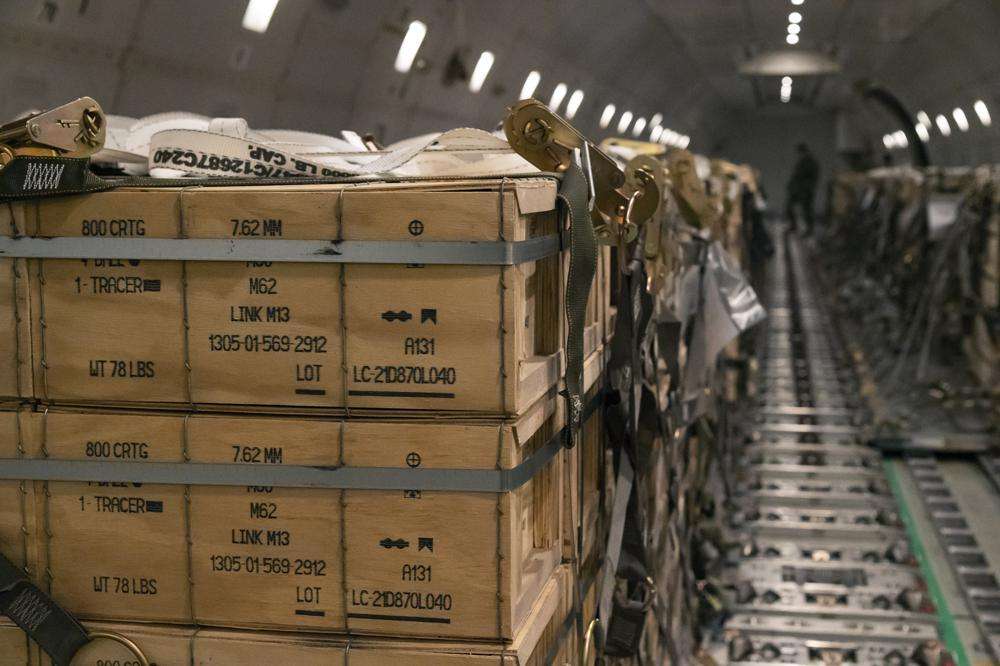 Pallets of ammunition, weapons and other equipment bound for Ukraine are loaded on a plane by members from the 436th Aerial Port Squadron at Dover Air Force Base, Del., on Jan. 30. The longer Ukraine's army fends off the invading Russians, the more it absorbs the advantages of Western weaponry and training.