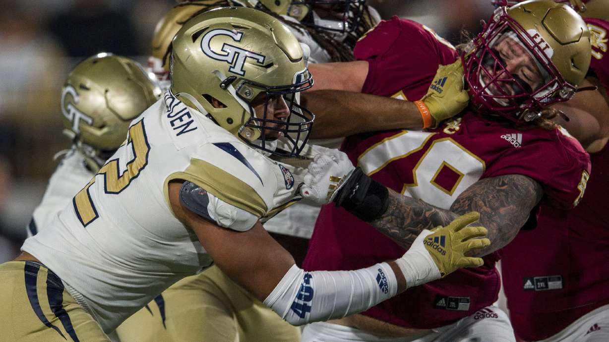 FILE - Georgia Tech defensive lineman Sylvain Yondjouen (32) works against Boston College offensive lineman Tyler Vrabel (78) during the second half of an NCAA college football game Nov. 13, 2021, in Atlanta. One player has been off limits for Tennessee Titans coach Mike Vrabel when preparing for the draft with general manager Jon Robinson: his oldest son Tyler.