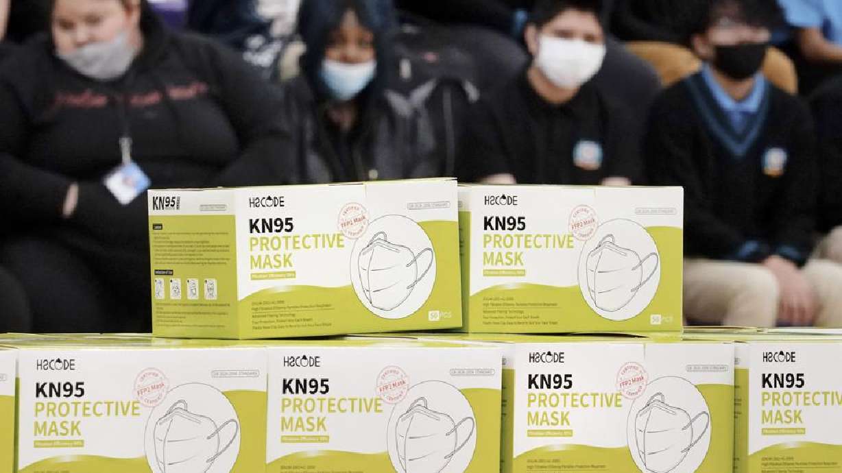 Boxes of KN95 protective masks are stacked together before being distributed to students at Camden High School in Camden, N.J., Feb. 9. According to a study by the CDC released Tuesday, three out of every four U.S. children have been infected with COVID-19.