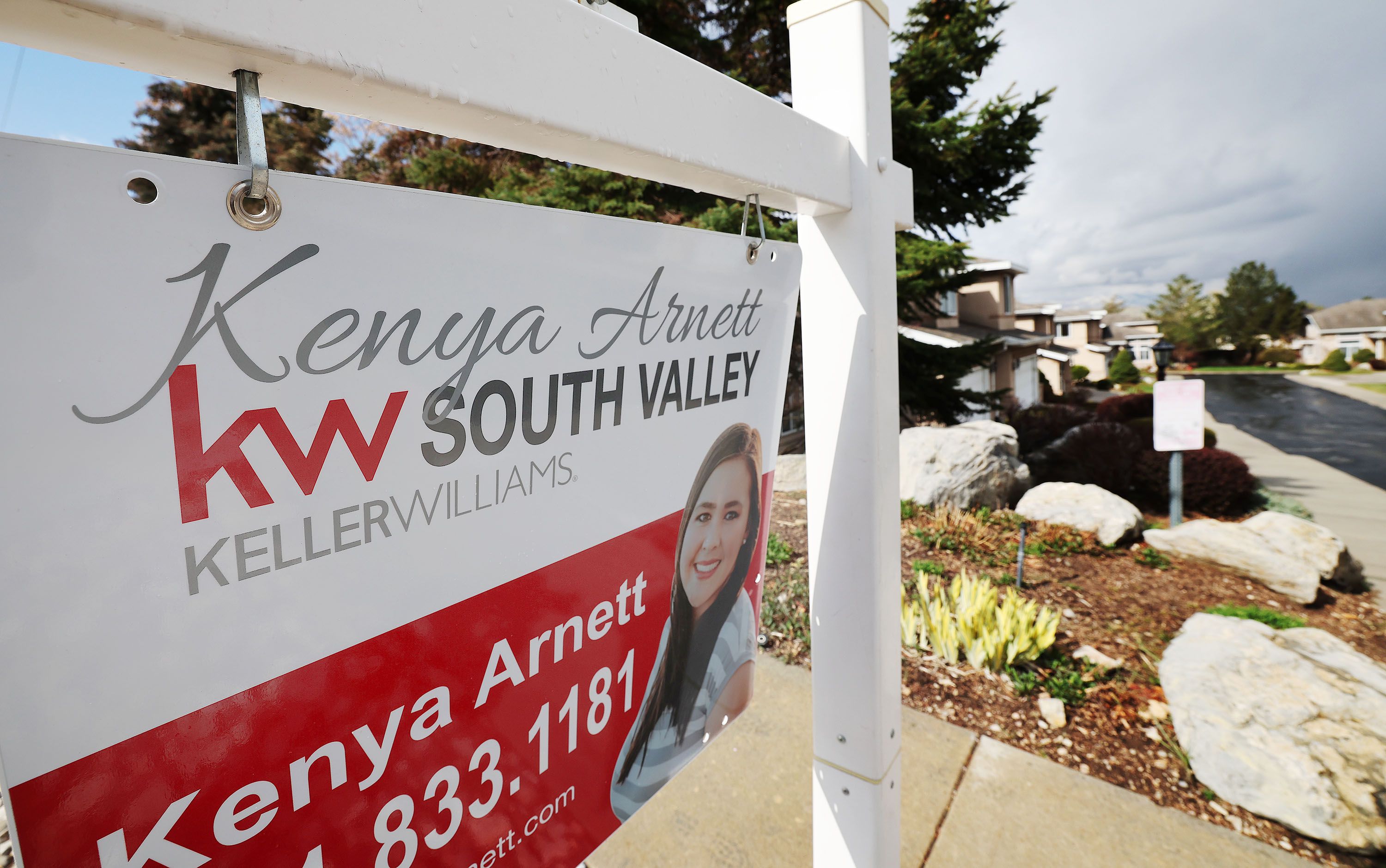 A “for sale” sign is pictured at a home in Cottonwood Heights on Friday, April 15, 2022. Home prices in major cities across the nation increased 19.8% in February year over year, according to the latest figures reported from the S&amp;P CoreLogic Case-Shiller national home price index.