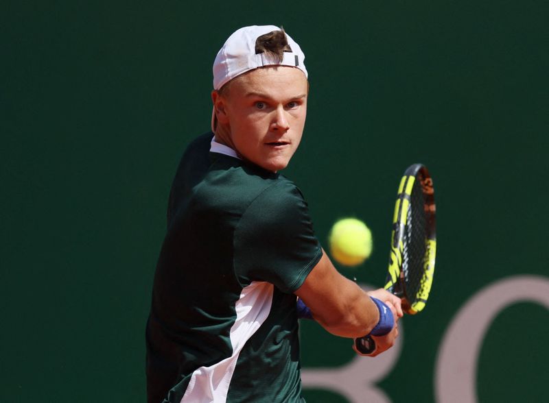 FILE PHOTO: Tennis - ATP Masters 1000 - Monte Carlo Masters - Monte-Carlo Country Club, Roquebrune-Cap-Martin, France - April 13, 2022 Denmark's Holger Rune in action during his second round match against Norway’s Casper Ruud