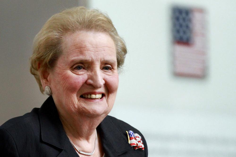 In this May 24, 2012, photo, former U.S. Secretary of State Madeleine Albright smiles at the Smithsonian National Museum of American History in Washington. President Joe Biden and top diplomats paid tribute on Wednesday to former Secretary of State Albright, the first woman to hold the job, who died last month at age 84.
