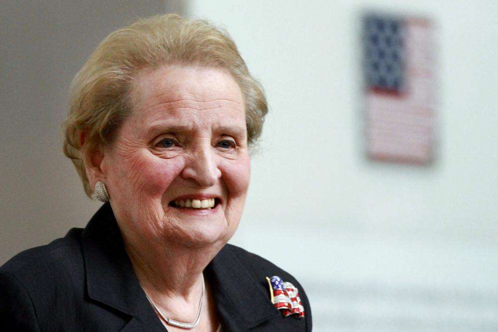 In this May 24, 2012, photo, former U.S. Secretary of State Madeleine Albright smiles at the Smithsonian National Museum of American History in Washington. President Joe Biden and top diplomats paid tribute on Wednesday to former Secretary of State Albright, the first woman to hold the job, who died last month at age 84.