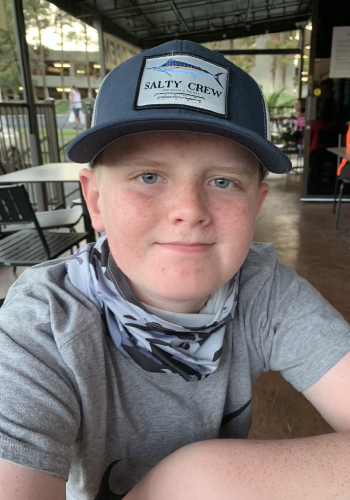 Eli Mitchell, 13, was riding his bicycle in a crosswalk when he was hit and killed by a man who then drove off. The driver, identified by police as Mason Andrew Ohms, 50, was criminally charged on Wednesday.