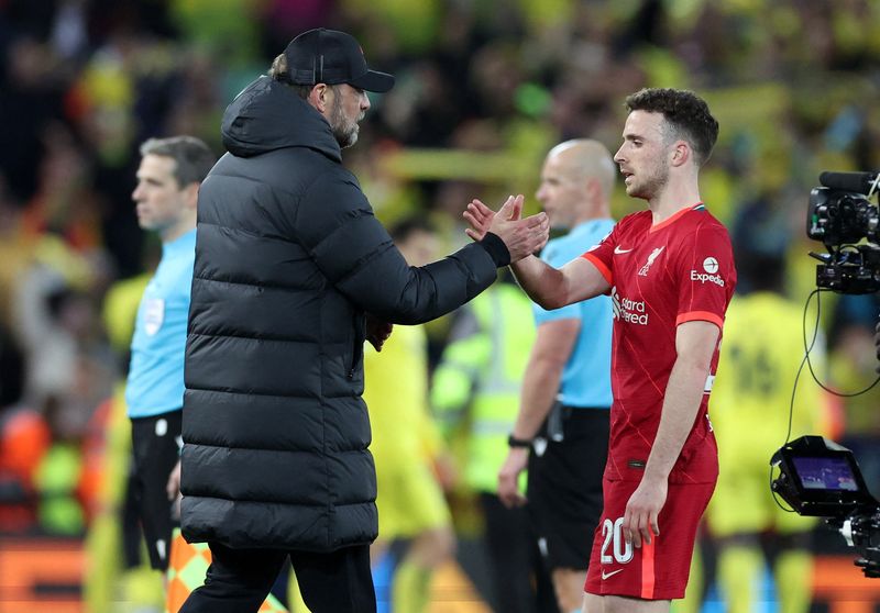 Soccer Football - Champions League - Semi Final - First Leg - Liverpool v Villarreal - Anfield, Liverpool, Britain - April 27, 2022 Liverpool manager Juergen Klopp with Diogo Jota after the match