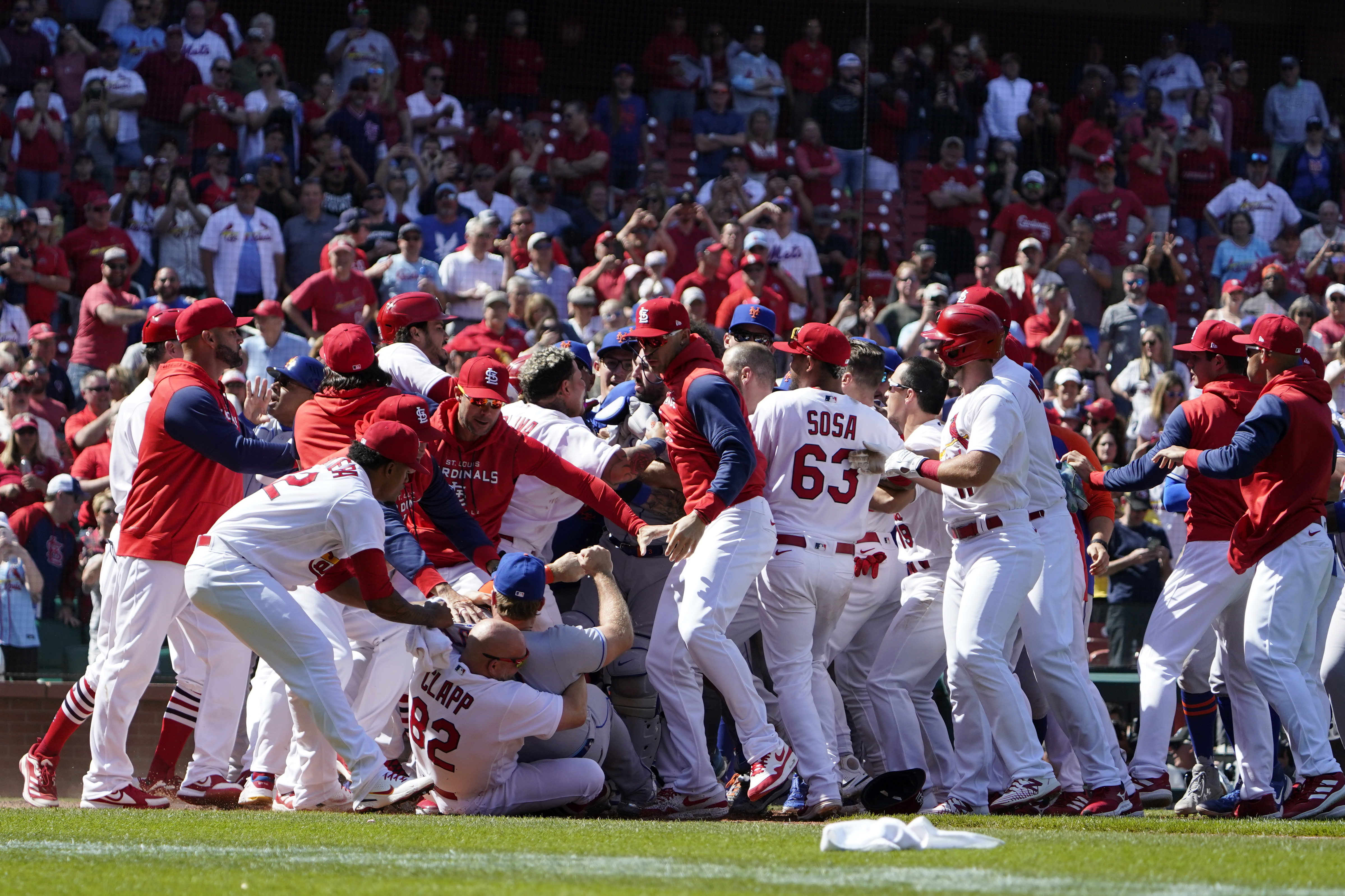 Benches clear during the eighth inning of a baseball game between the St. Louis Cardinals and the New York Mets Wednesday, April 27, 2022, in St. Louis. 
