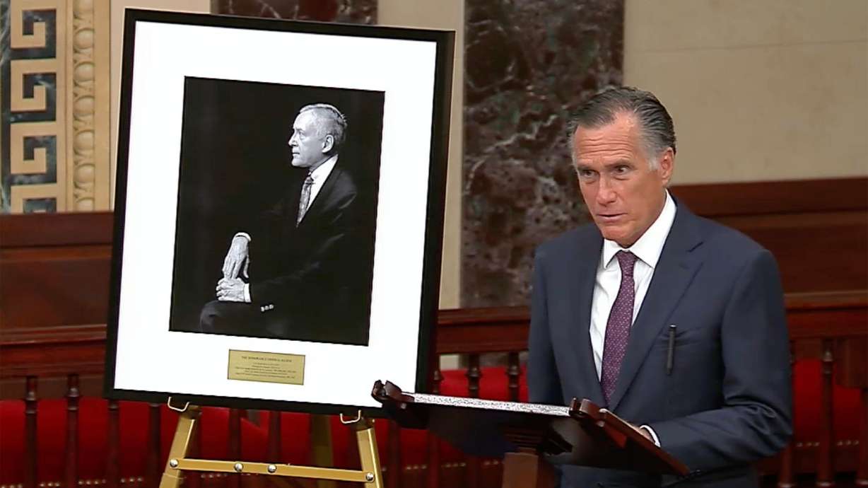 Sen. Mitt Romney, R-Utah, speaks in honor of the late Sen. Orrin Hatch on Wednesday, at the U.S. Capitol Senate chambers. Hatch died Saturday at age 88.