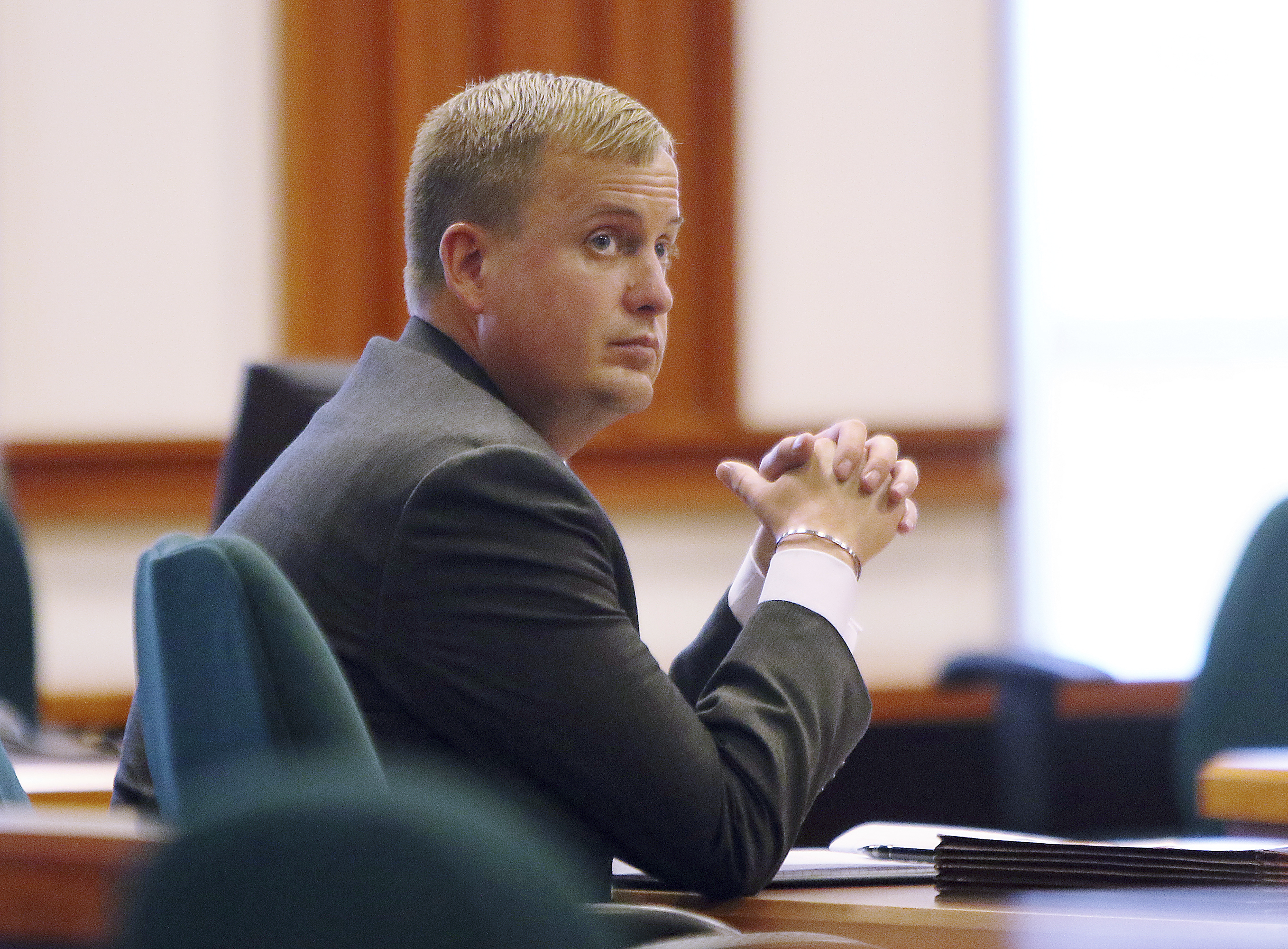 Former Idaho state Rep. Aaron von Ehlinger looks on as the defense asks questions of a witness during the second day of testimony in his rape trial at the Ada County Courthouse, Wednesday, in Boise.
