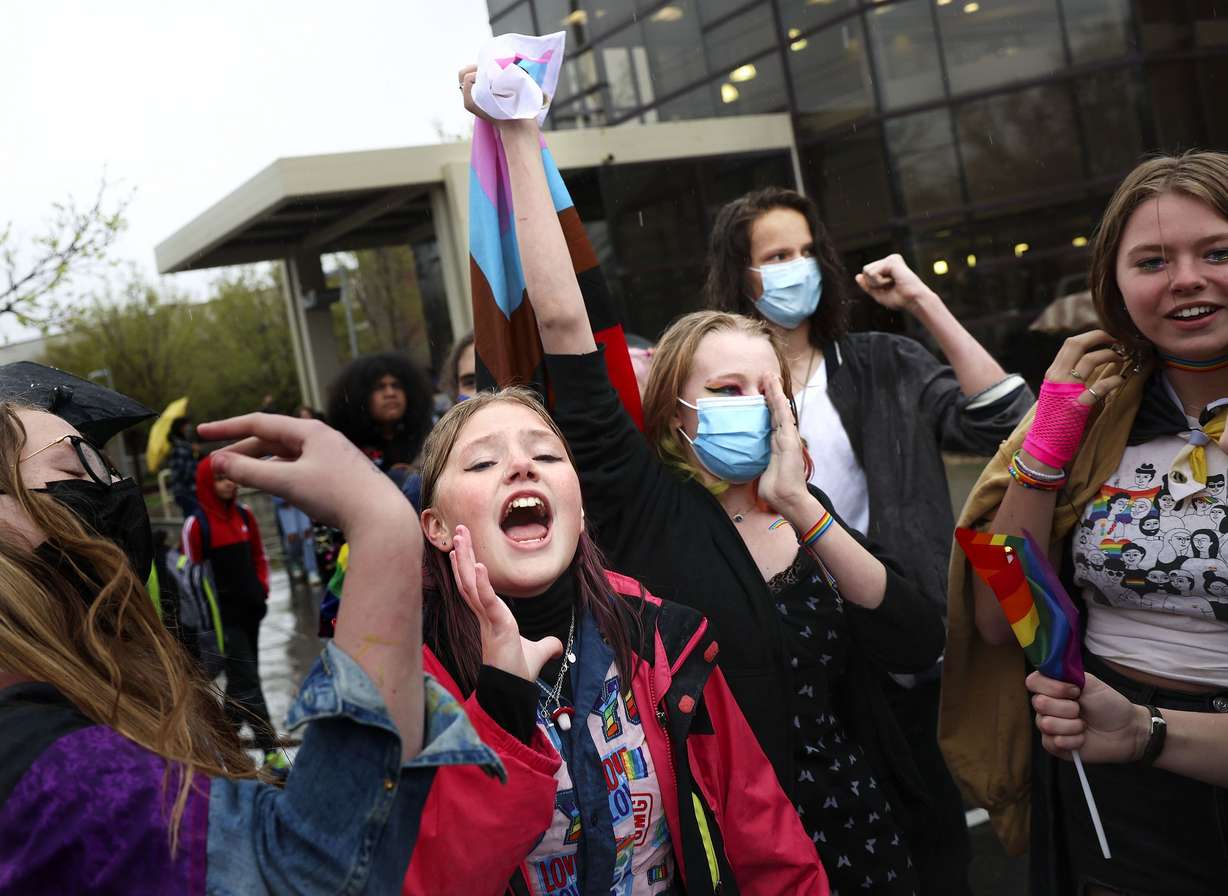 Clayton Middle School students, including 13-year-old Caroline Drake, second from left, participate in a walkout to protest HB11, the ban on transgender students in school sports, in Salt Lake City last Friday.