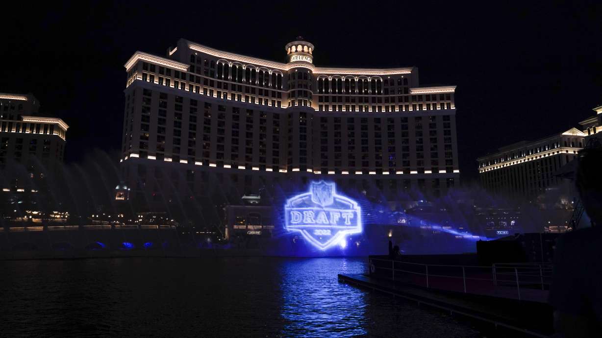 A logo of the 2022 NFL football draft is projected at the Fountains of Bellagio on Wednesday, April 27, 2022, in Las Vegas, the day before the draft.