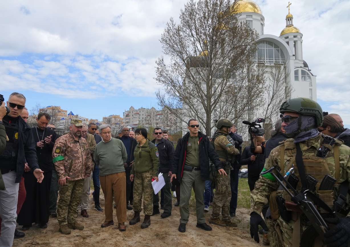 U.N. Secretary-General Antonio Guterres, fourth left, is seen during his visit to Bucha, on the outskirts of Kyiv, Ukraine, Thursday.