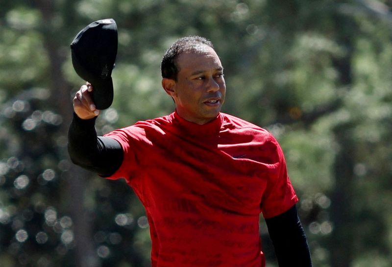 FILE PHOTO: Golf - The Masters - Augusta National Golf Club - Augusta, Georgia, U.S. - April 10, 2022 Tiger Woods of the U.S. on the 18th green during the final round
