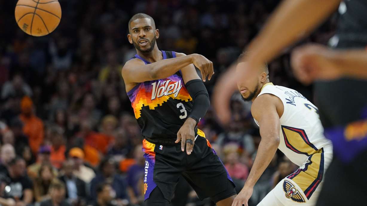 Phoenix Suns guard Chris Paul (3) passes against the New Orleans Pelicans during the first half of Game 5 of an NBA basketball first-round playoff series, Tuesday, April 26, 2022, in Phoenix.