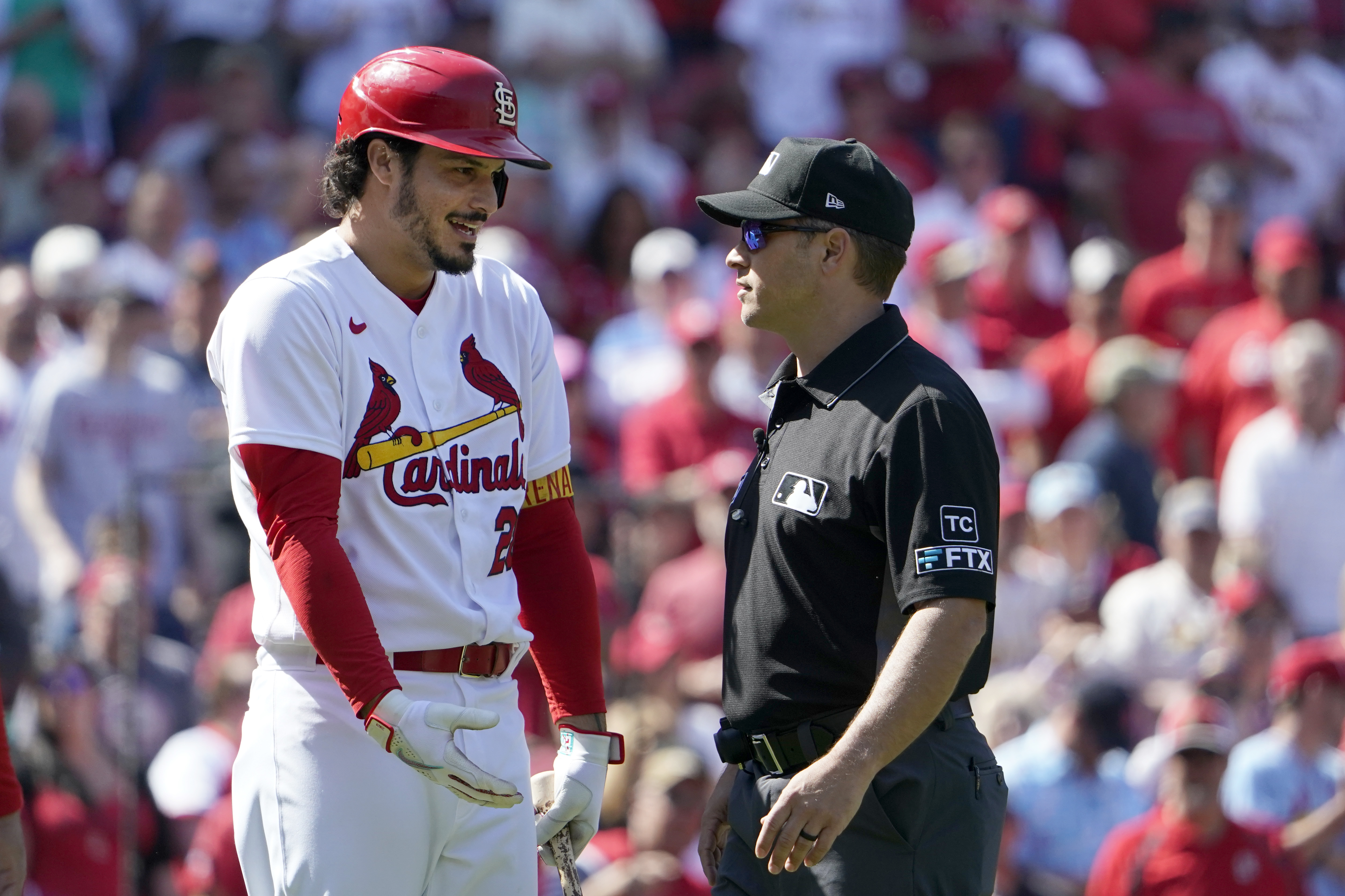 St. Louis Cardinals' Nolan Arenado, left, argues with umpire crew chief Mark Wegner after being ejected during the eighth inning of a baseball game against the New York Mets Wednesday, April 27, 2022, in St. Louis. 