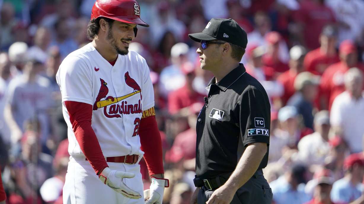 St. Louis Cardinals' Nolan Arenado, left, argues with umpire crew chief Mark Wegner after being ejected during the eighth inning of a baseball game against the New York Mets Wednesday, April 27, 2022, in St. Louis.