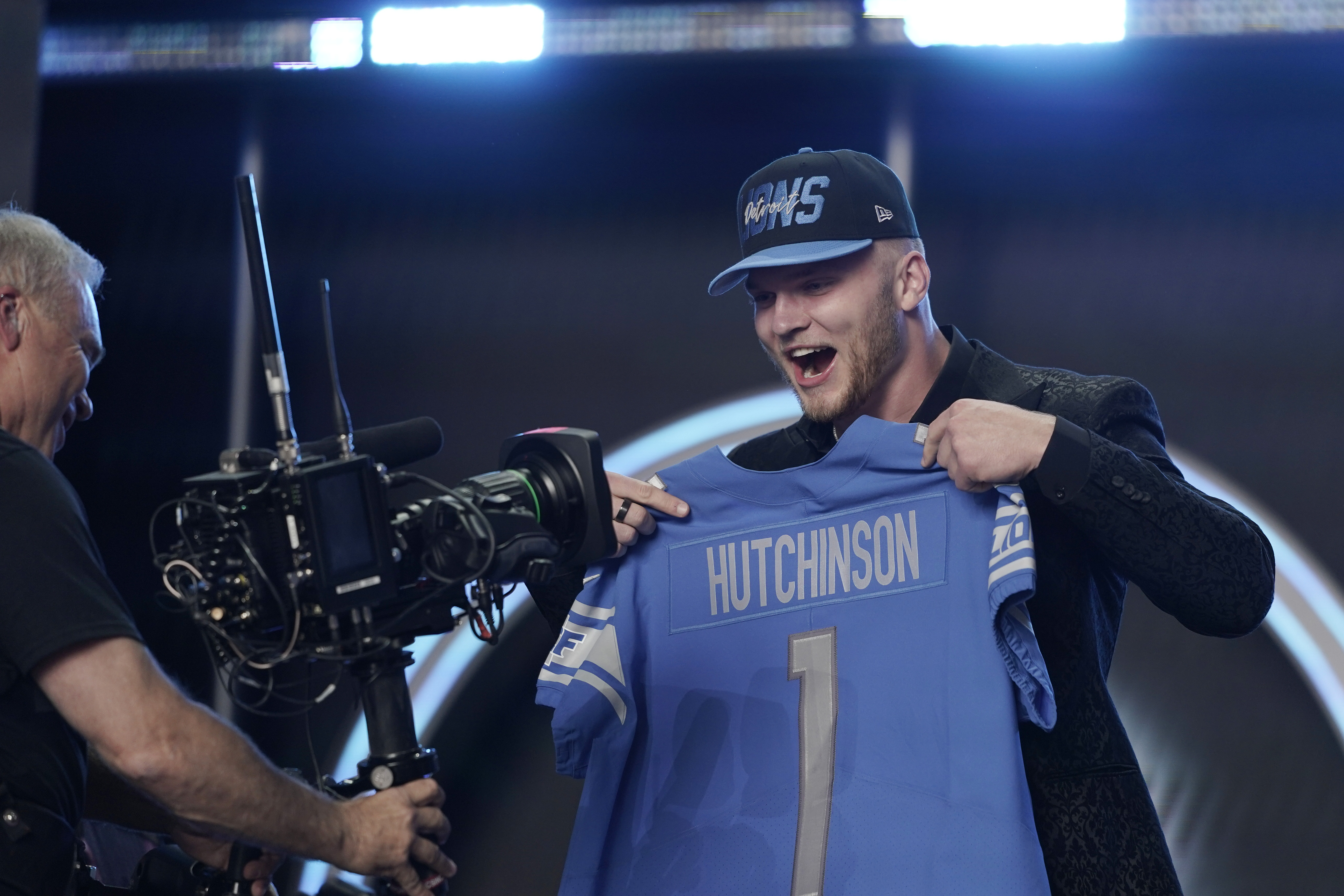 Michigan defensive end Aidan Hutchinson celebrates being selected by the Detroit Lions as the second pick in the NFL football draft Thursday, April 28, 2022, in Las Vegas. 