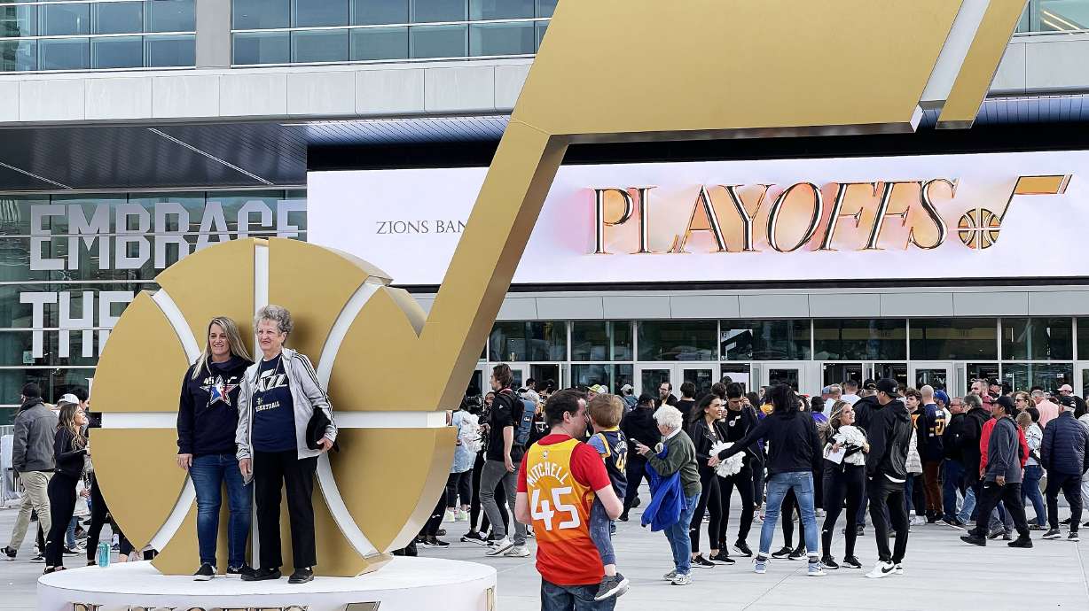 Fans take photos prior to the Utah Jazz and Dallas Maveriks game 6 of the playoffs in Salt Lake City on Thursday, April 28, 2022.