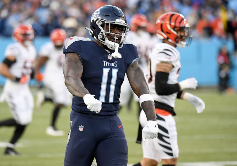 FILE PHOTO: Jan 22, 2022; Nashville, Tennessee, USA; Tennessee Titans wide receiver A.J. Brown (11) celebrates after a catch during the first half of an AFC Divisional playoff football game against the Cincinnati Bengals at Nissan Stadium.