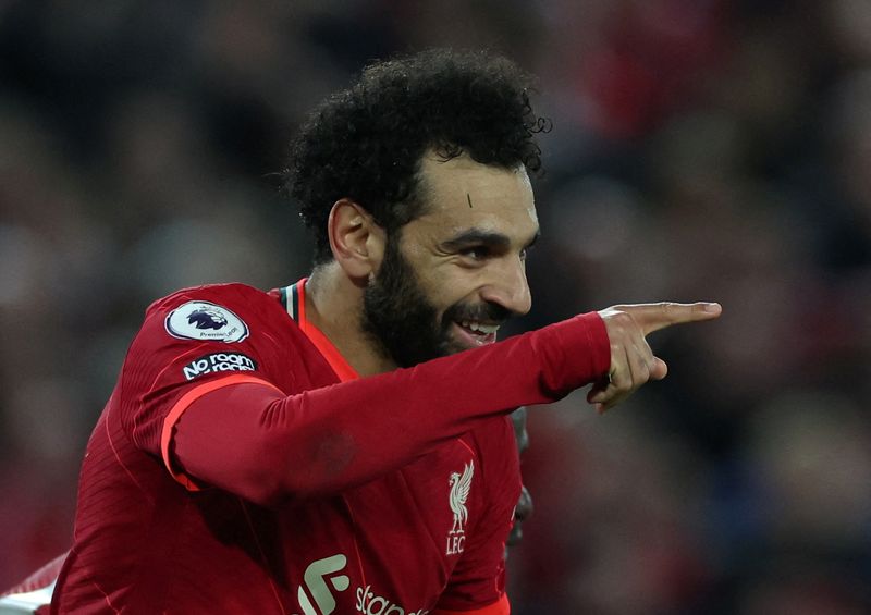 FILE PHOTO: Soccer Football - Premier League - Liverpool v Manchester United - Anfield, Liverpool, Britain - April 19, 2022 Liverpool's Mohamed Salah celebrates scoring their fourth goal