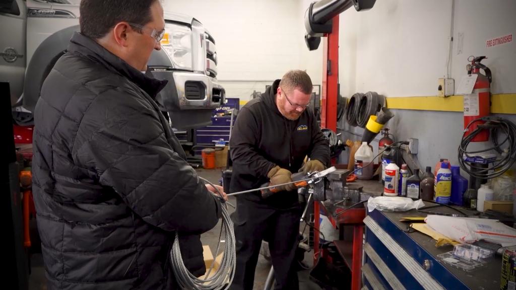 Chris Pappas of Hillside Tire tests the Cat Clamp April 8. It includes a 5/16th-inch cable that effectively cages the catalytic converter to your car’s frame.