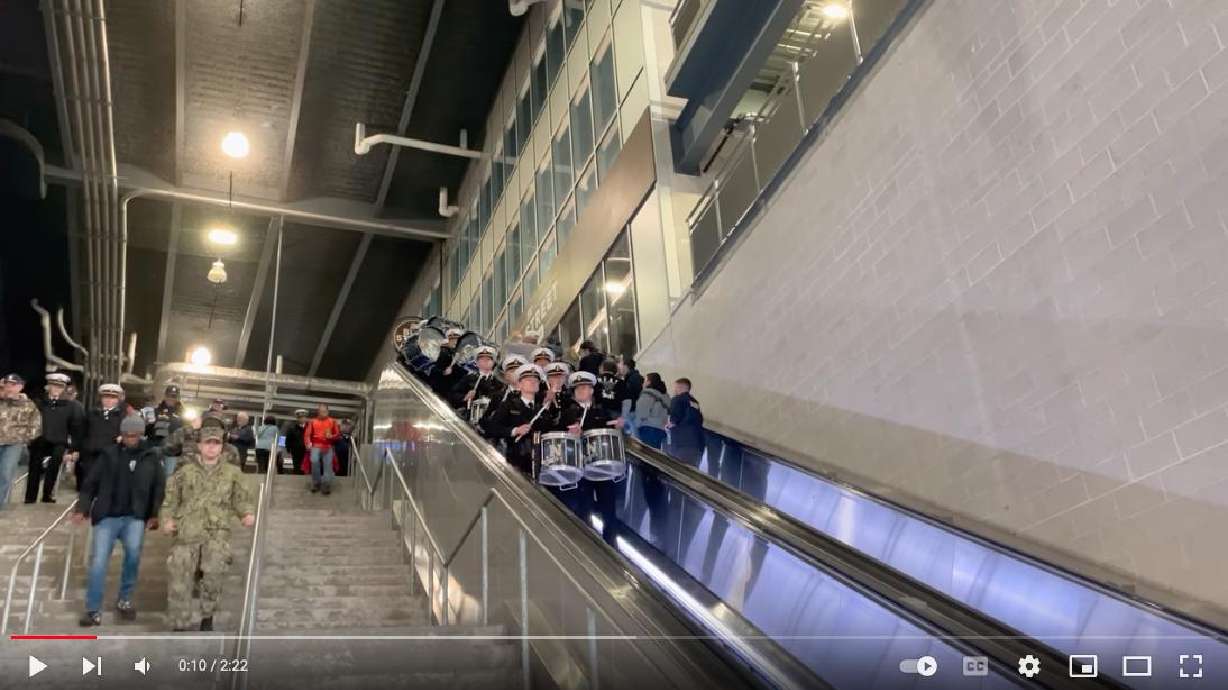 Navy's drumline performs while riding the escalator at the 122nd Army-Navy football game on Dec.11, 2021.