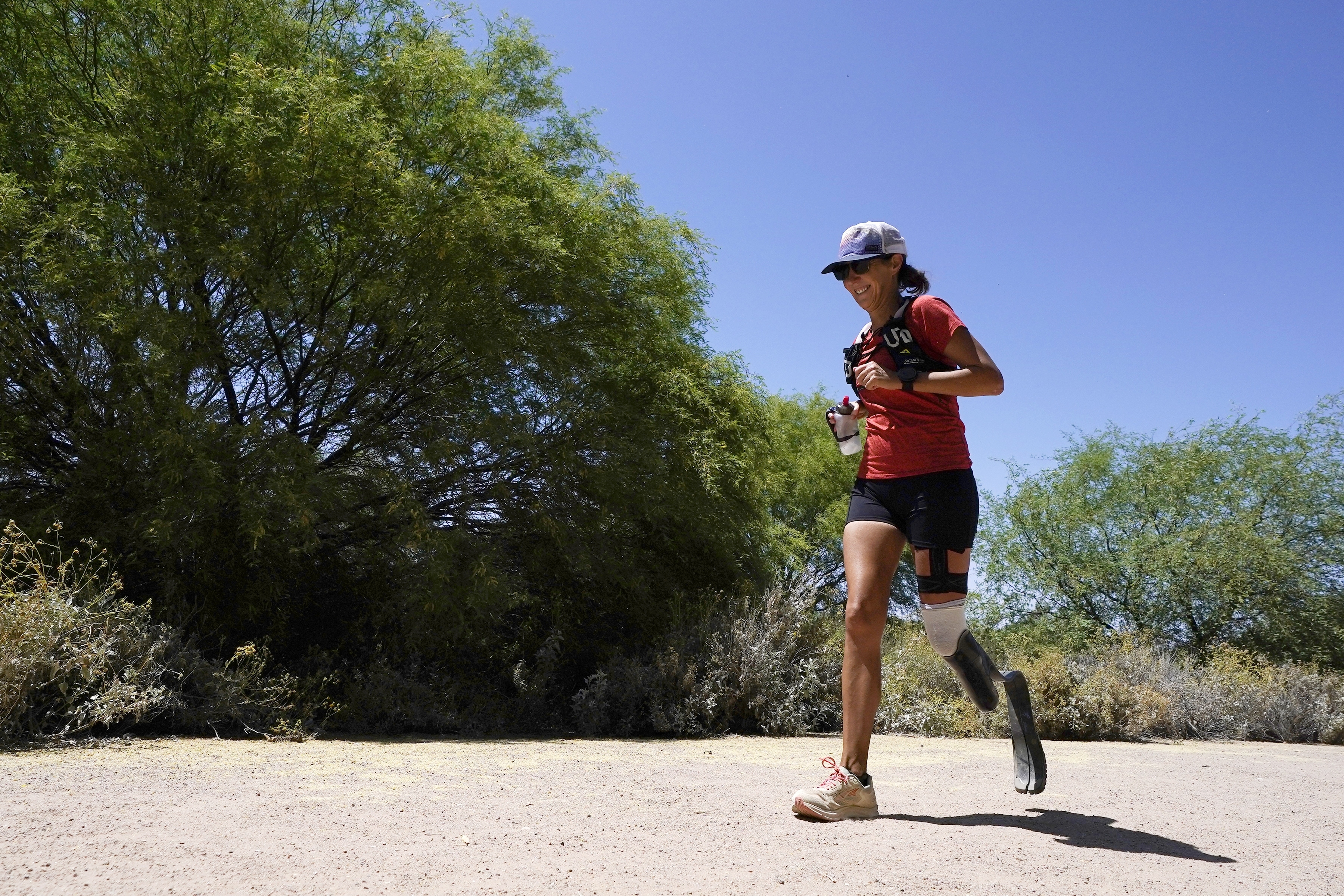Jacky Hunt-Broersma runs her 102nd marathon in 102 days, this one at Veterans Oasis Park, Thursday, April 28, 2022, in Chandler, Ariz. 