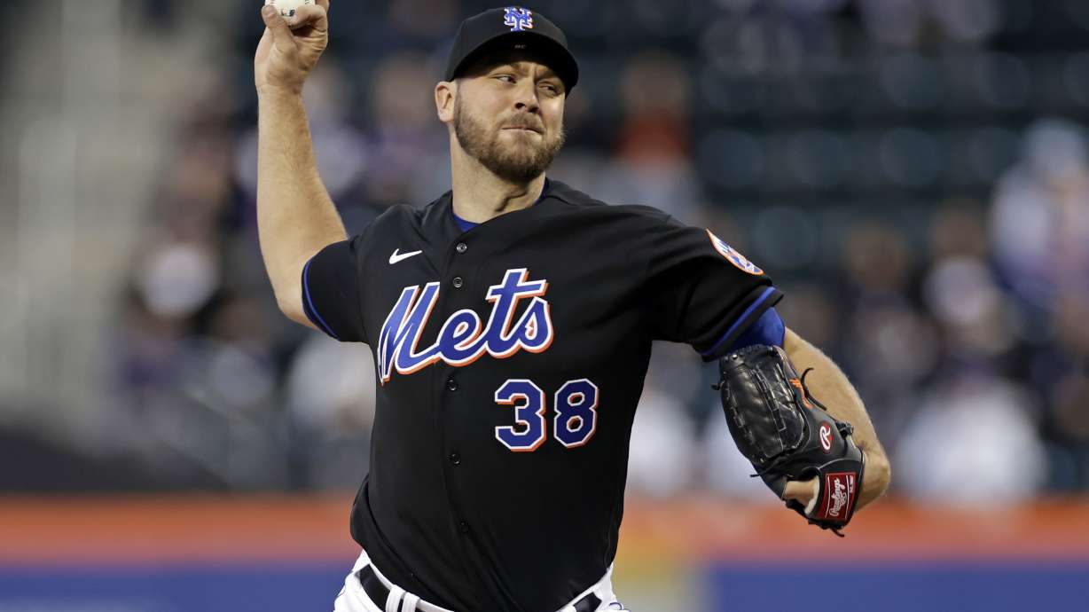New York Mets pitcher Tylor Megill throws during the first inning of the team's baseball game against the Philadelphia Phillies on Friday, April 29, 2022, in New York.