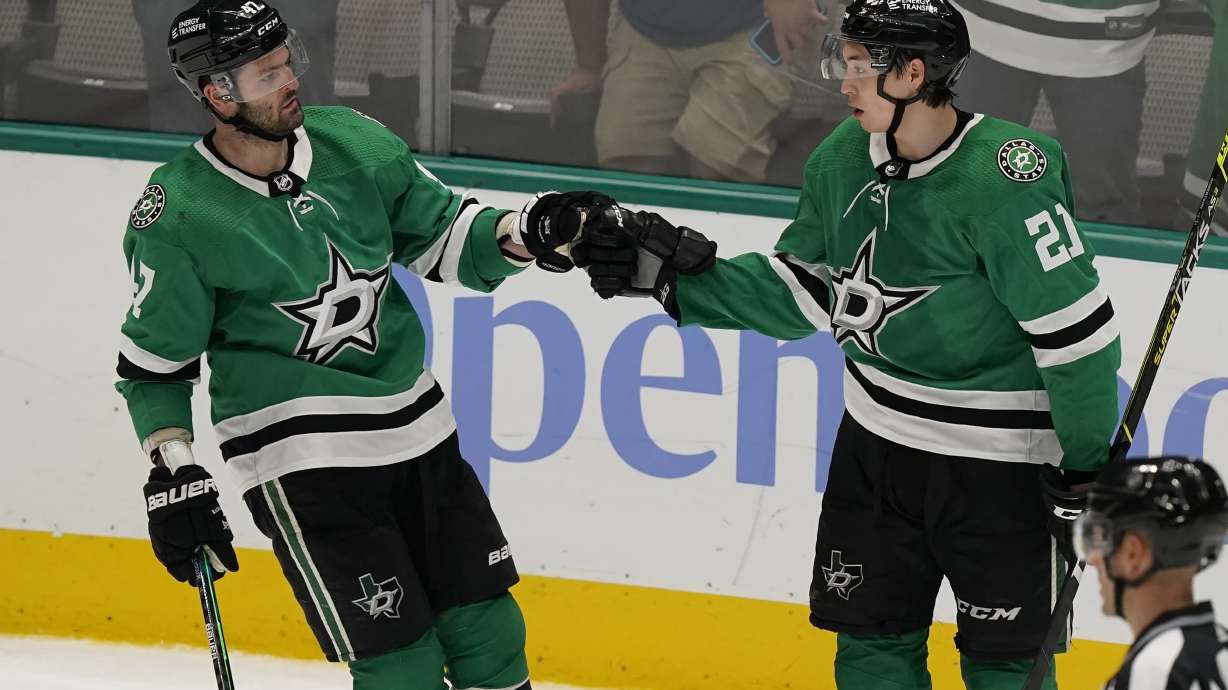 Dallas Stars left wing Jason Robertson (21) celebrates his goal right wing Alexander Radulov (47) during the third period of an NHL hockey game against the Anaheim Ducks in Dallas, Friday, April 29, 2022. The Stars won 4-2.